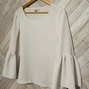 Calvin Klein Blouse with 3/4 bell sleeves. Worn once.